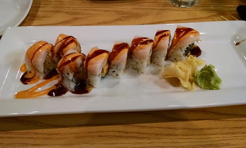 Sushi UNI signature dishes  Unagi Maki Daikon Roll, 87th Street Roll, Chiefs Roll, Crab Rangoon.
